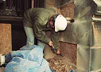 Stonemason at work on an indent.